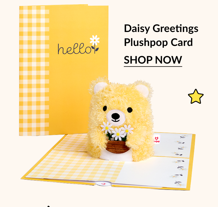 Yellow “hello” card with plushpop bear holding daisies.