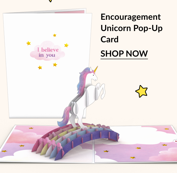 “I believe in you” card with pop-up unicorn on a rainbow bridge.