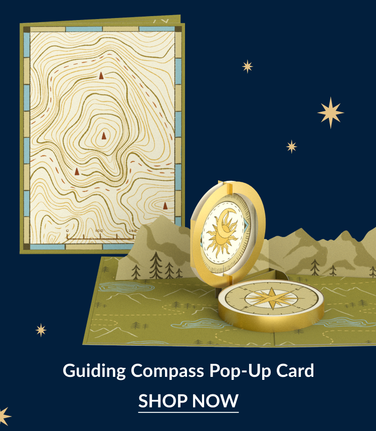 Guiding Compass pop-up card featuring a golden compass and map design