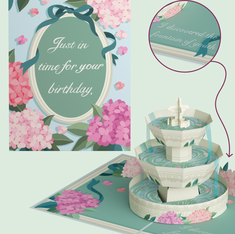 Pop-up card close-up with fountain and hydrangea details.