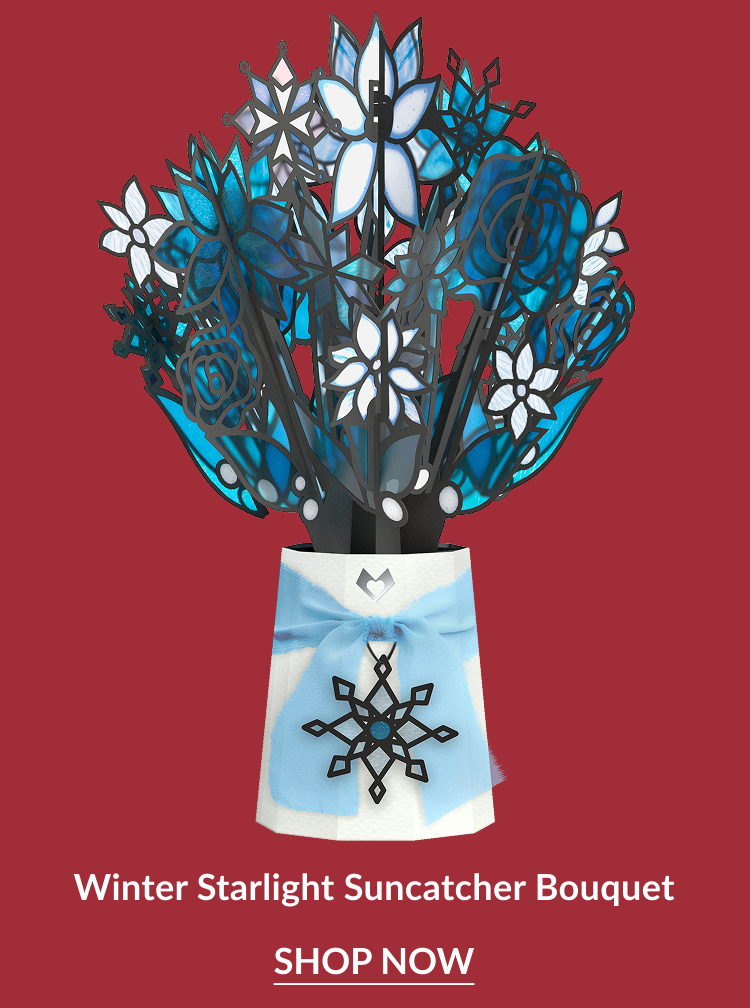 Winter Starlight Suncatcher Bouquet with blue and white stained-glass flowers