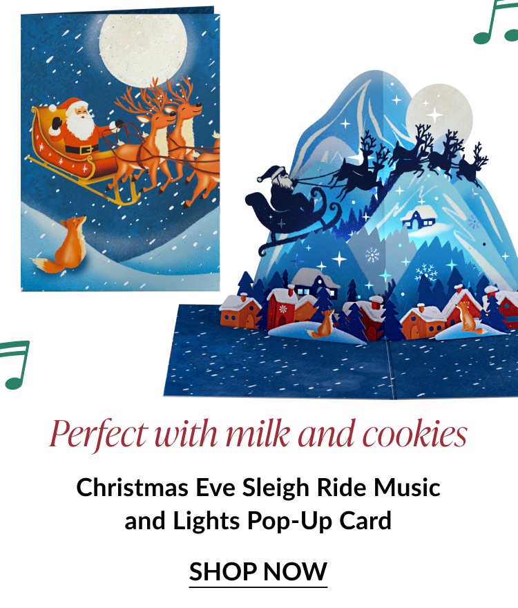 Christmas Eve Sleigh Ride Music and Lights Pop-Up Card with Santa flying over snowy village