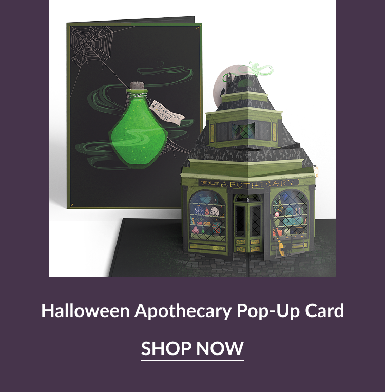 Halloween Apothecary pop-up card with green potion and spooky shop