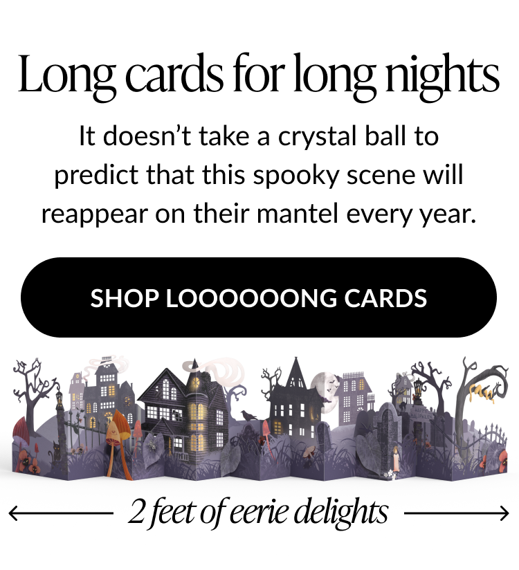 Halloween long pop-up card showing eerie haunted houses and graveyard