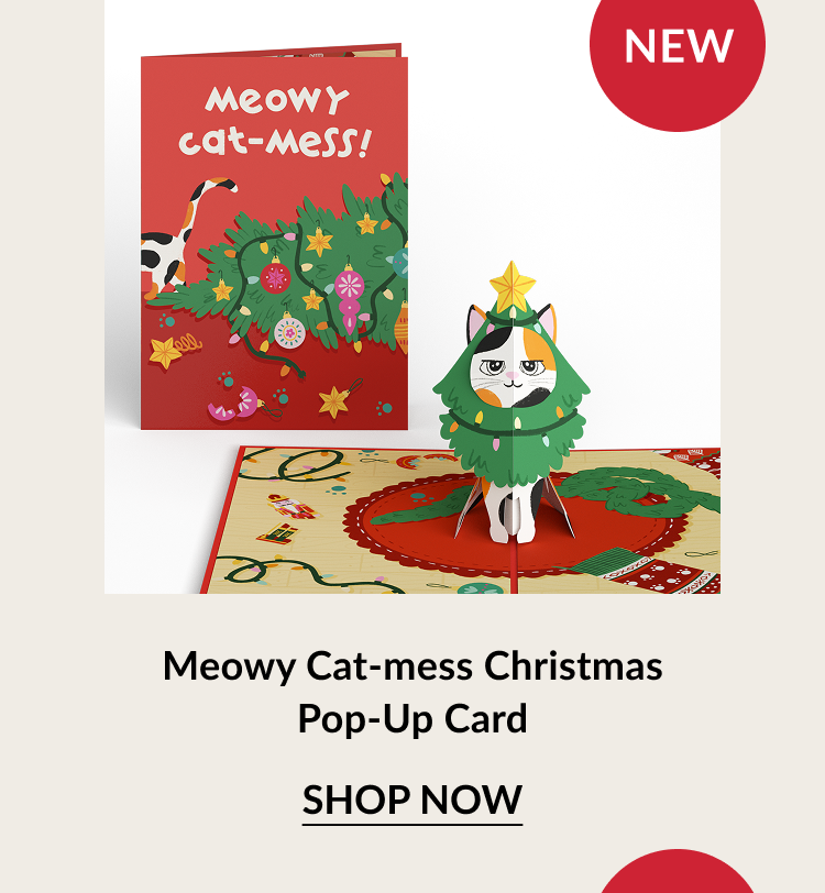 Meowy Cat-mess Christmas Pop-Up Card with cat dressed as Christmas tree. Label: New. Button: Shop now