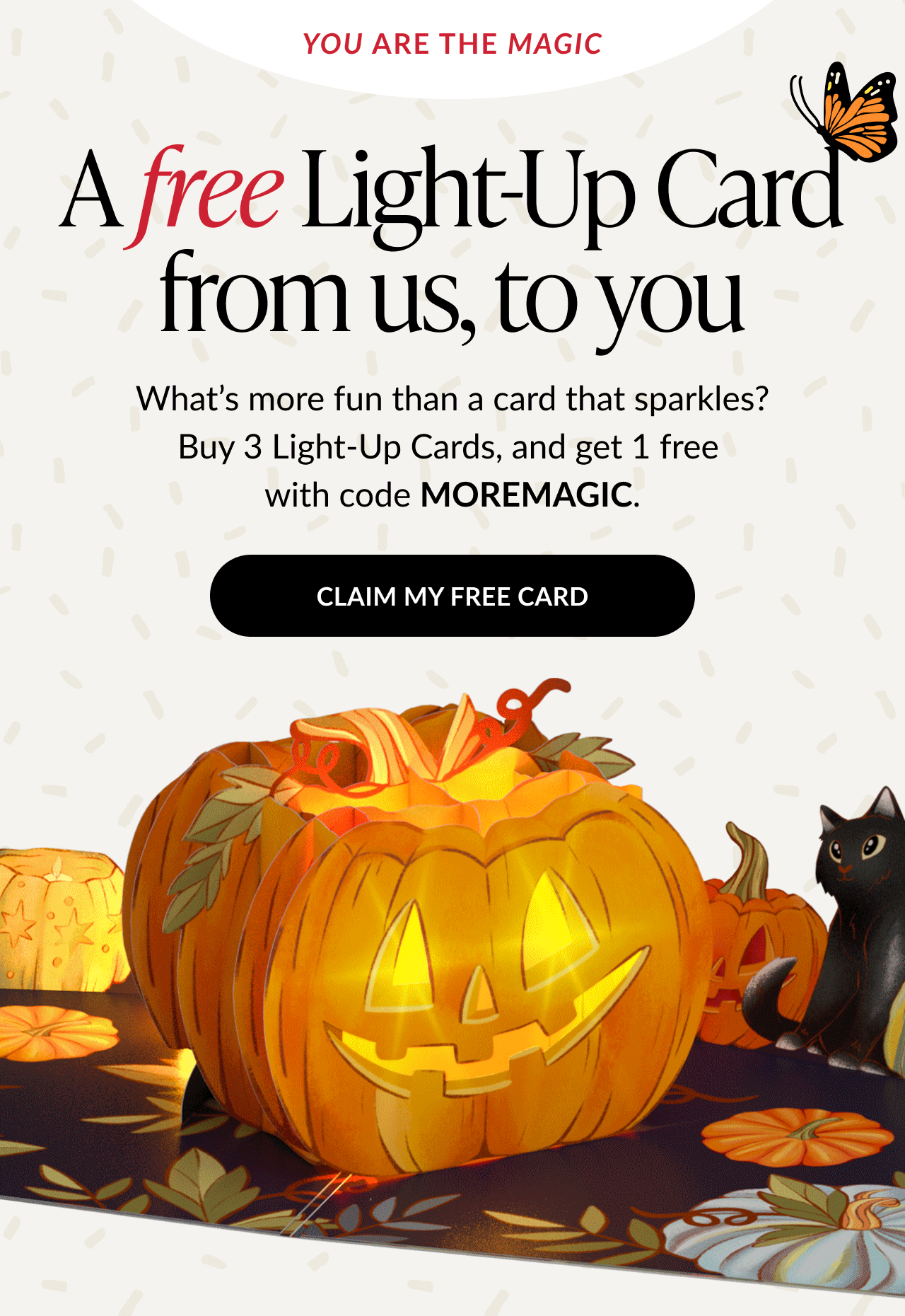 You are the magic, free Light-Up Card offer with glowing jack-o’-lantern pop-up and black cat