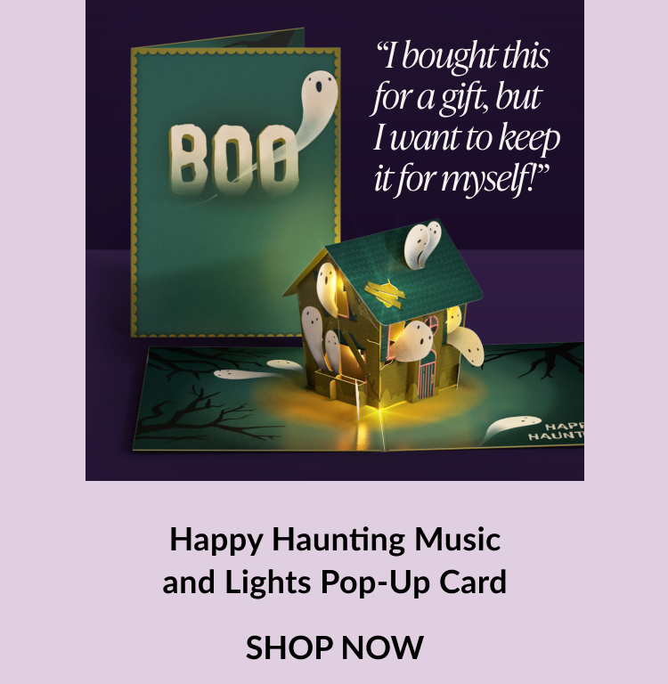 Happy Haunting Music and Lights Pop-Up Card with glowing haunted house and ghosts