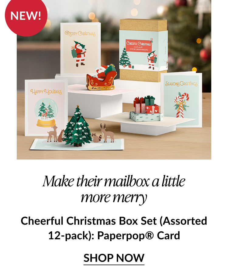 Christmas-themed box set display with Santa, reindeer, tree, gifts, and candy cane cards; labeled “Cheerful Christmas Box Set.”