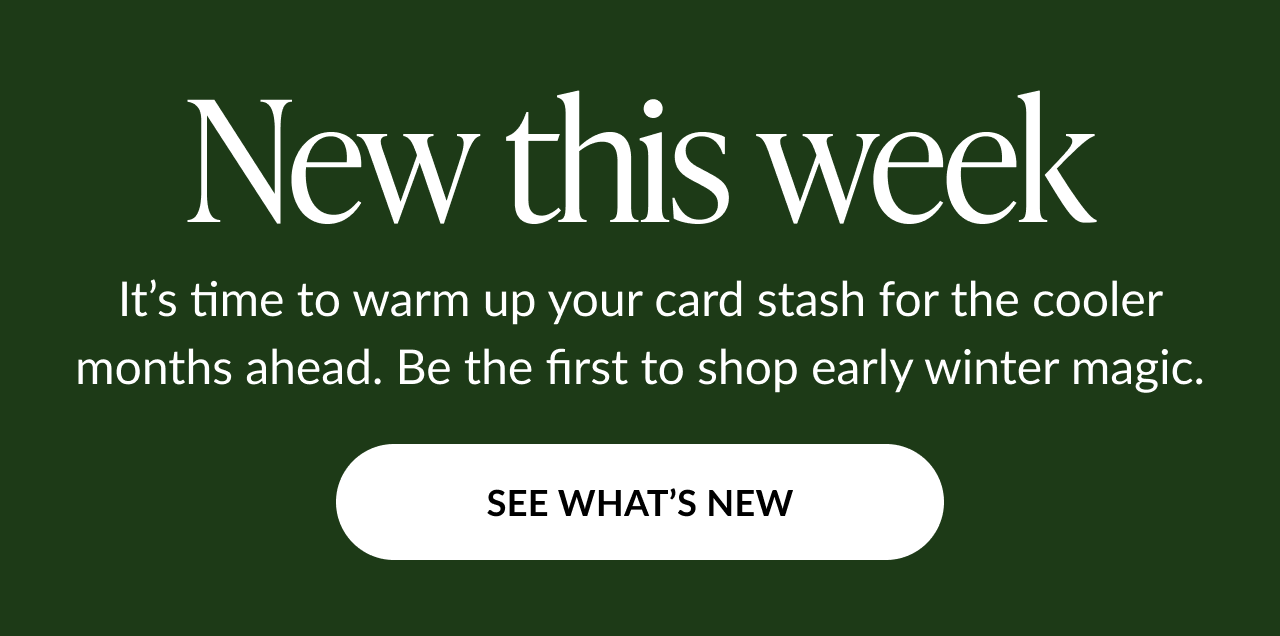 Dark green banner with headline “New this week” and text inviting customers to shop early winter card designs; white button reads “SEE WHAT’S NEW.”