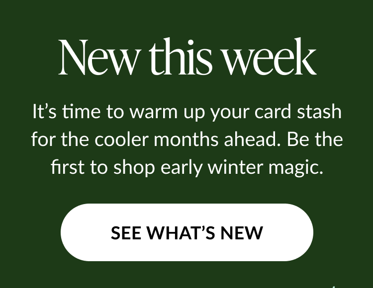 Dark green banner with headline “New this week” and text inviting customers to shop early winter card designs; white button reads “SEE WHAT’S NEW.”