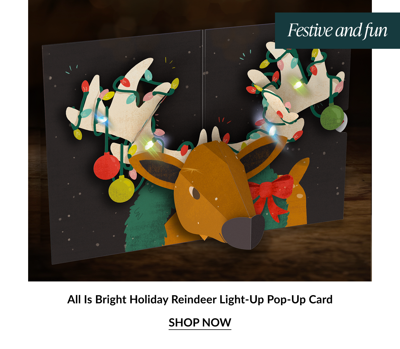 Reindeer card with glowing ornaments and lights on antlers
