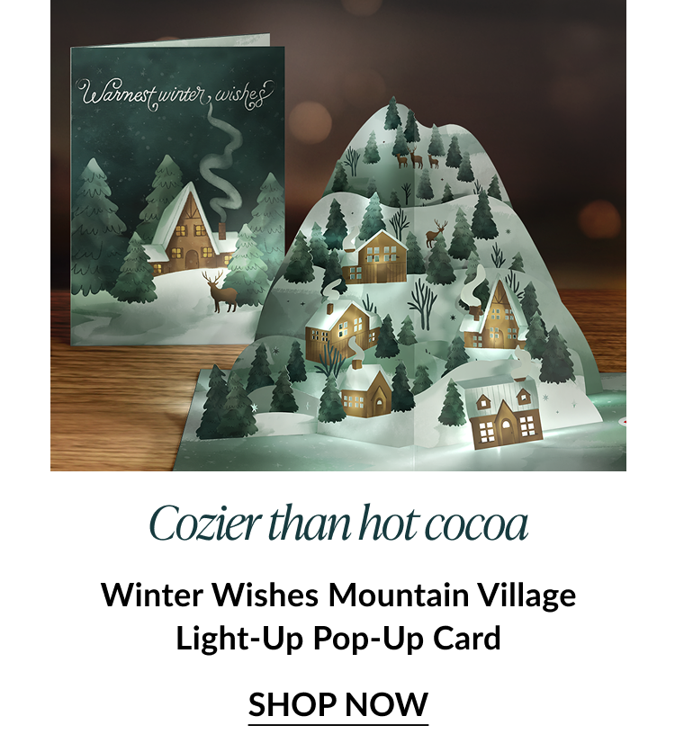 Winter village card with cozy cabin scene and light up pop up mountain