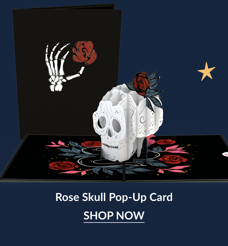 Rose skull pop up card with skeleton hand and red rose