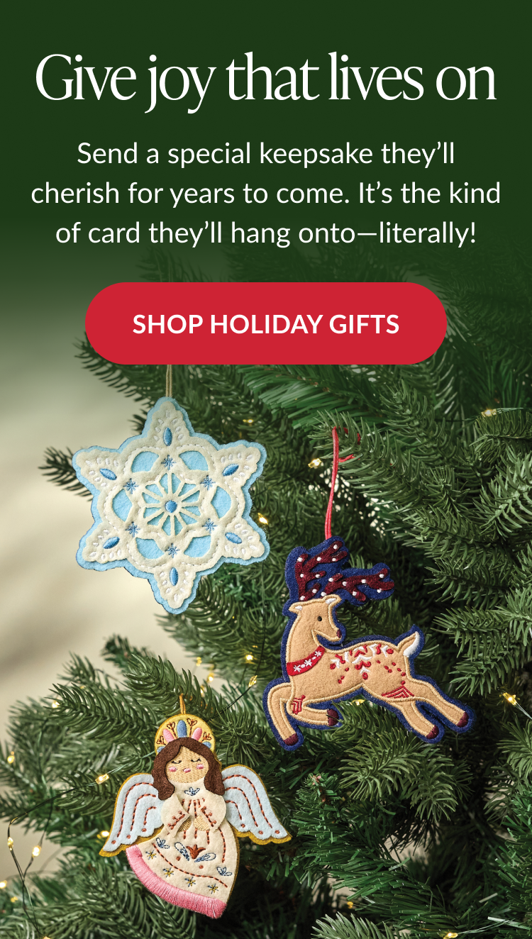 Give joy message with embroidered ornaments on Christmas tree