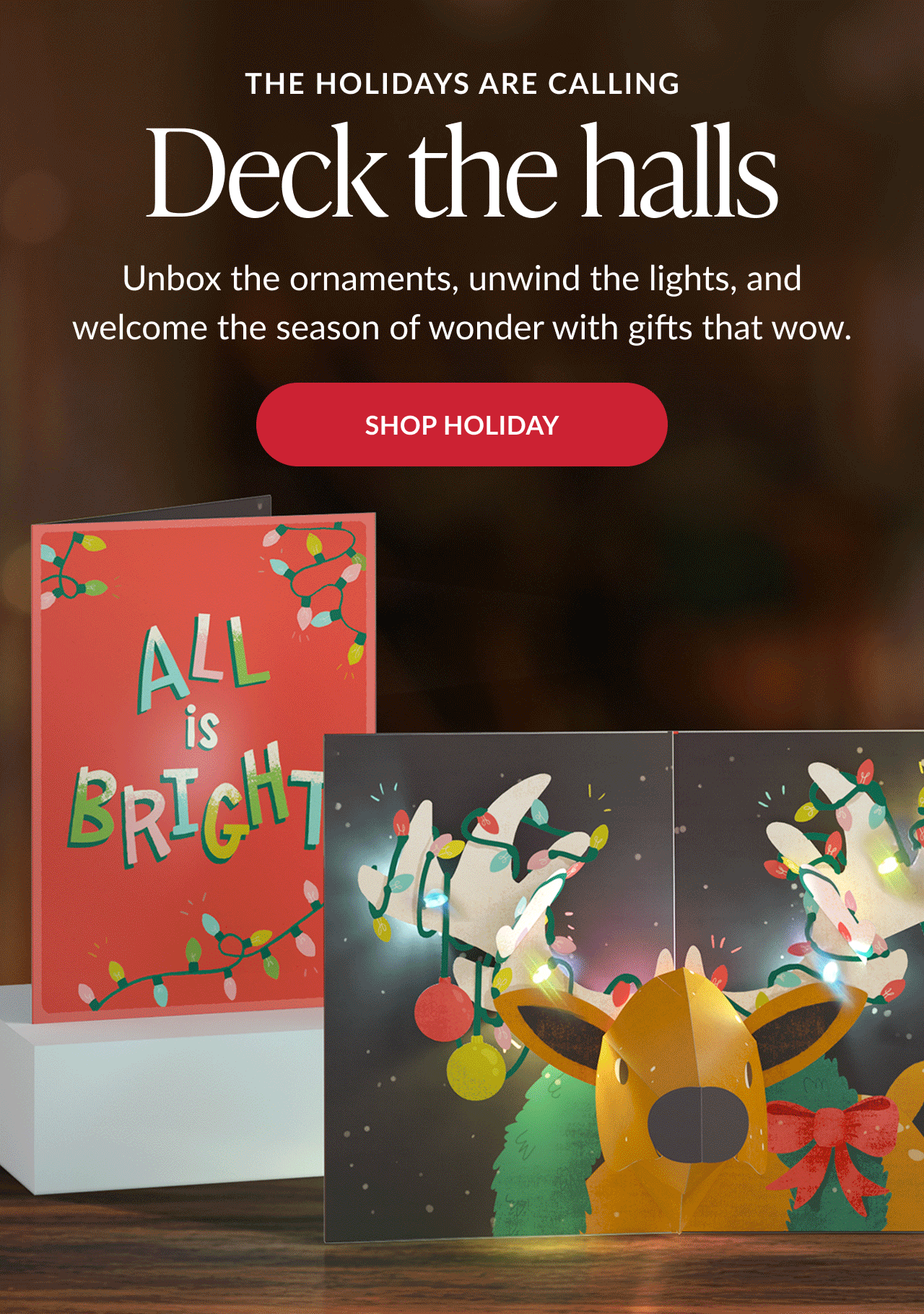 Holiday cards with all is bright message and glowing reindeer antlers