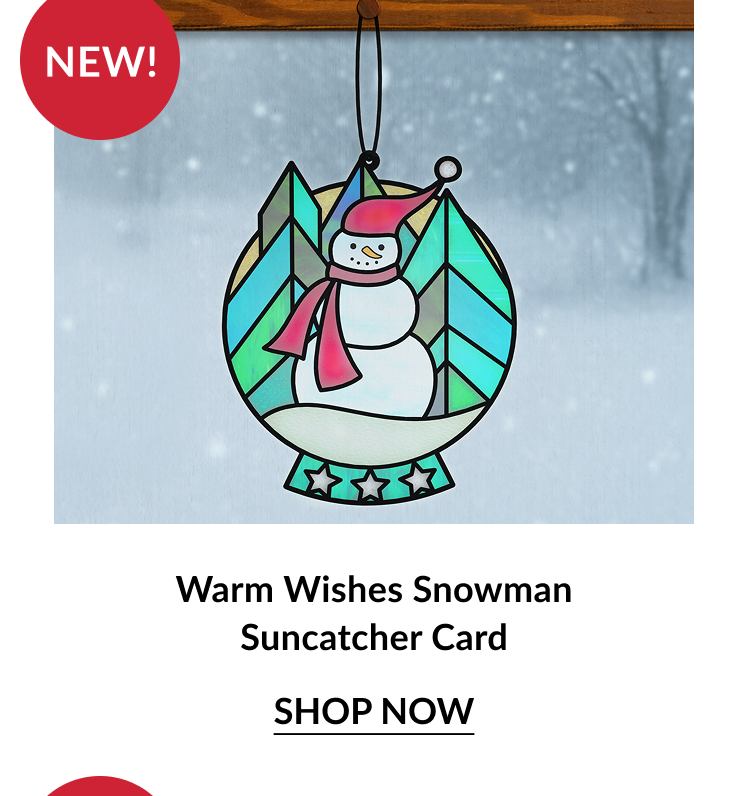 Warm Wishes Snowman Suncatcher Card featuring a snowman in front of snowy trees with a red scarf and pink hat