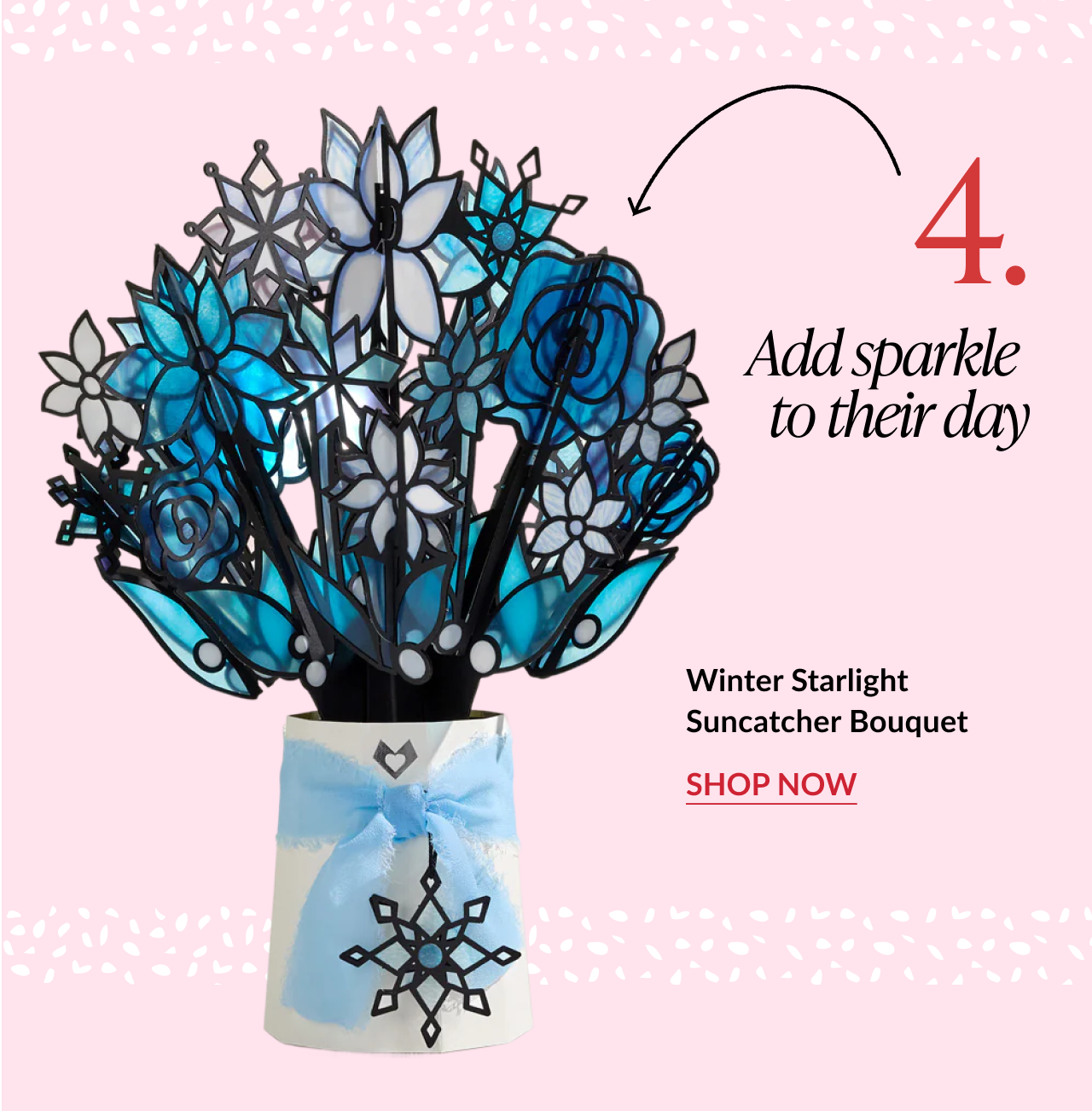 Winter Starlight Suncatcher Bouquet with frosted blue and white flowers in snowflake vase