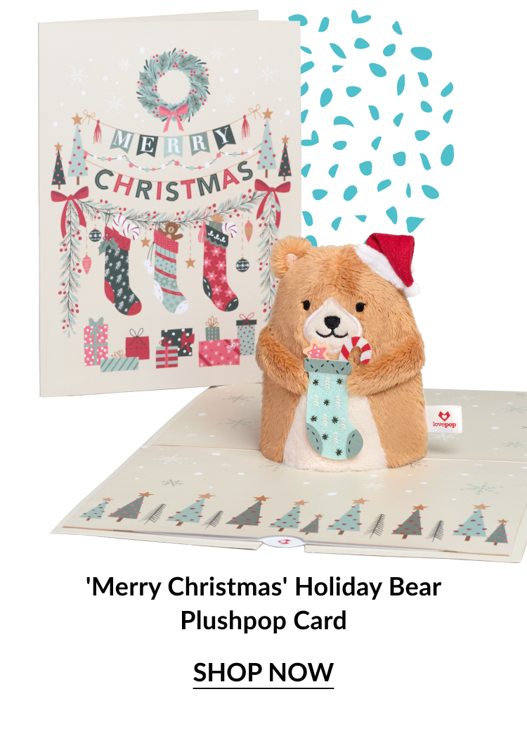 Merry Christmas Holiday Bear Plushpop Card with cream card decorated with stockings and bear plush in Santa hat and shop now
