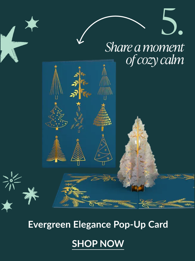 Evergreen Elegance Pop-Up Card showing navy blue and gold design with pop-up white Christmas tree captioned share a moment of cozy calm and shop now button