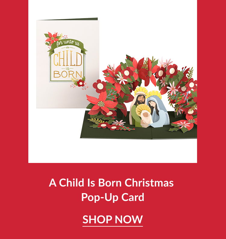 A Child Is Born Christmas Pop-Up Card showing nativity scene with Mary Joseph and baby Jesus surrounded by poinsettias and greenery with matching card that reads for unto us a child is born and shop now button