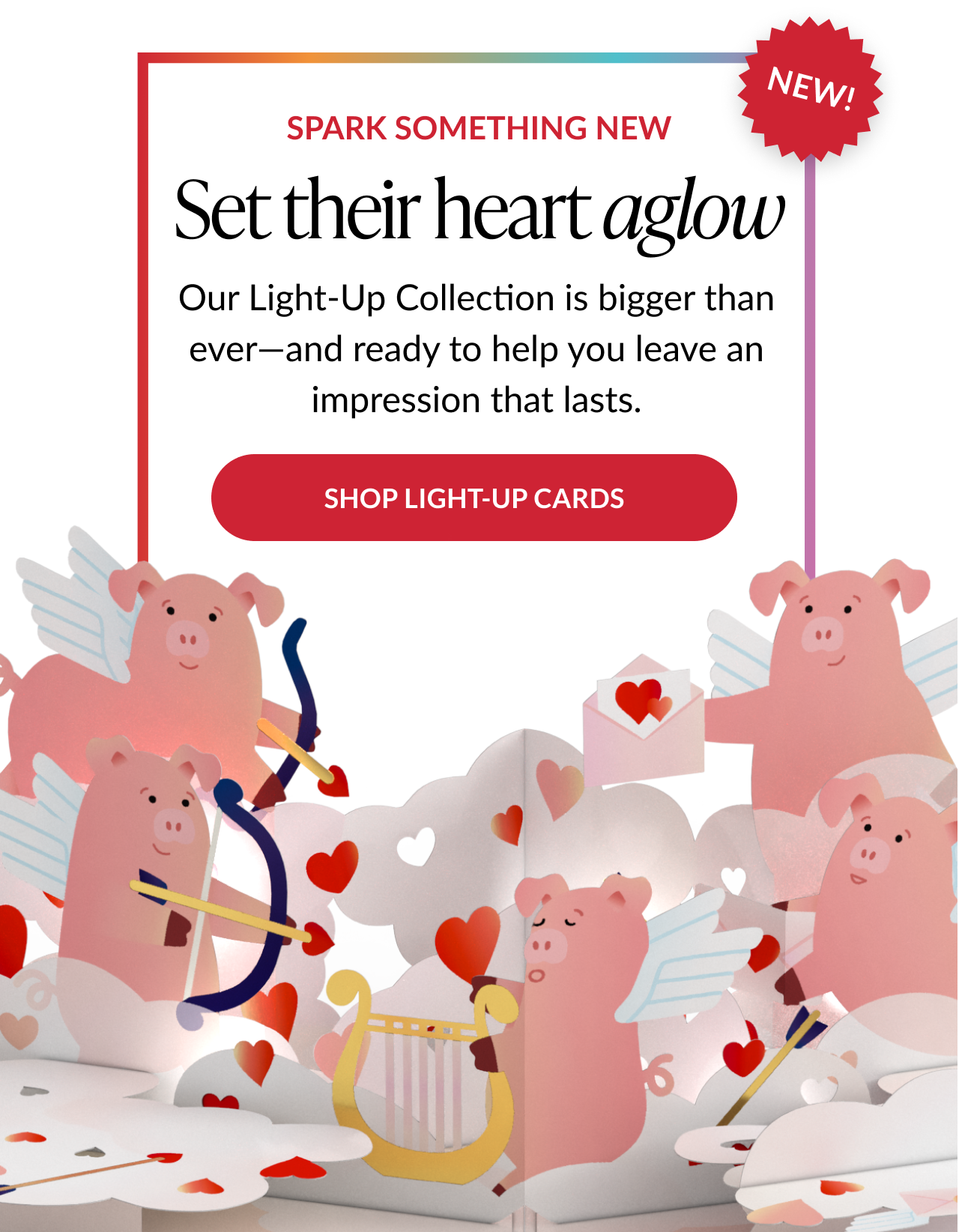 Promotional banner for Light-Up cards featuring winged pigs as cupids, glowing hearts, and Shop Light-Up Cards button