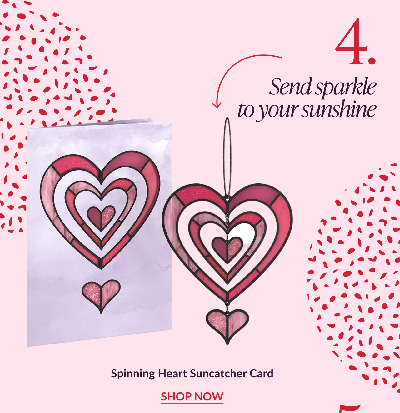 Spinning Heart suncatcher card with layered pink and red heart shapes hanging from a string