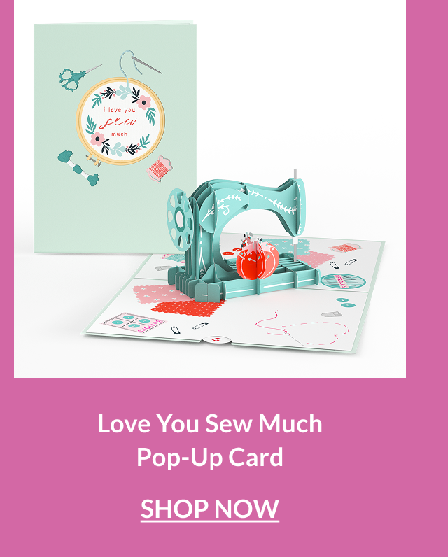 Pop-up card with a teal sewing machine, thread, and heart-shaped fabric details on a crafting-themed base.