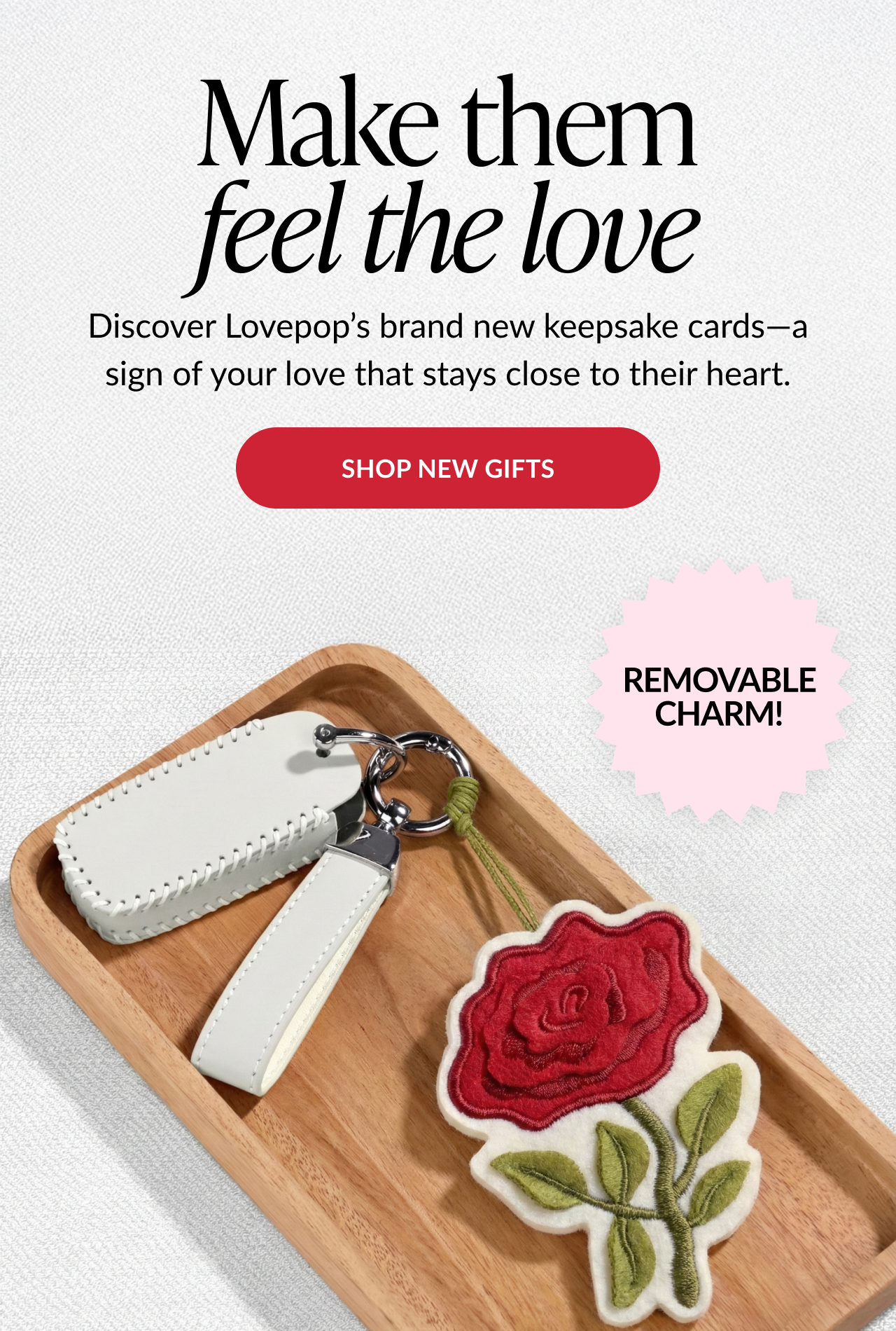 Promotional banner reading “Make them feel the love” with Lovepop keepsake charm gifts and a Shop New Gifts button
