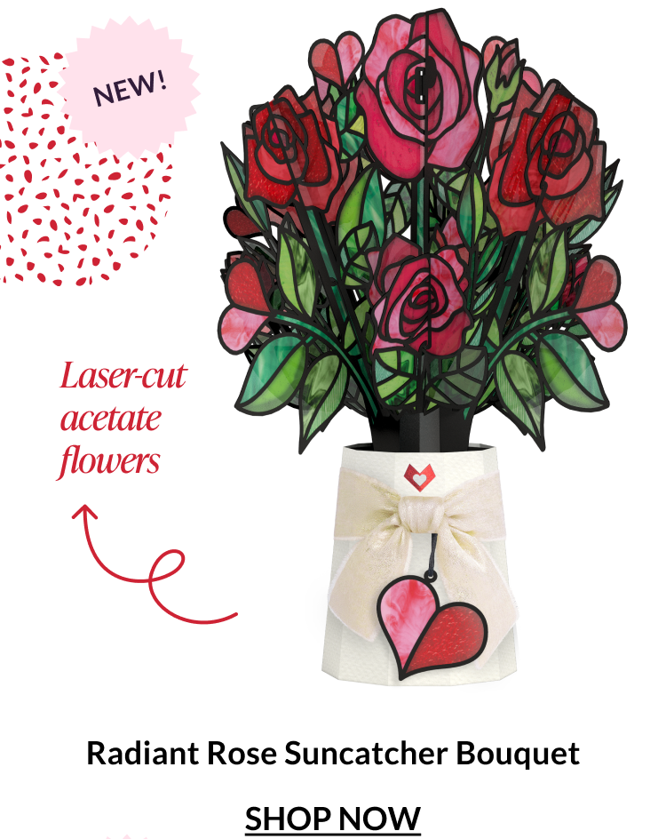 Radiant Rose suncatcher bouquet with laser-cut acetate flowers displayed in a wrapped vase