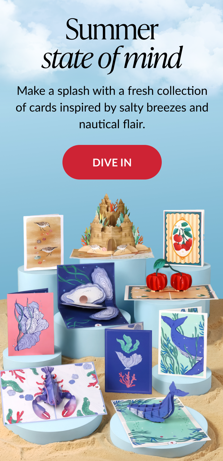 Coastal-themed pop-up cards featuring ocean and sea life designs — shop the collection