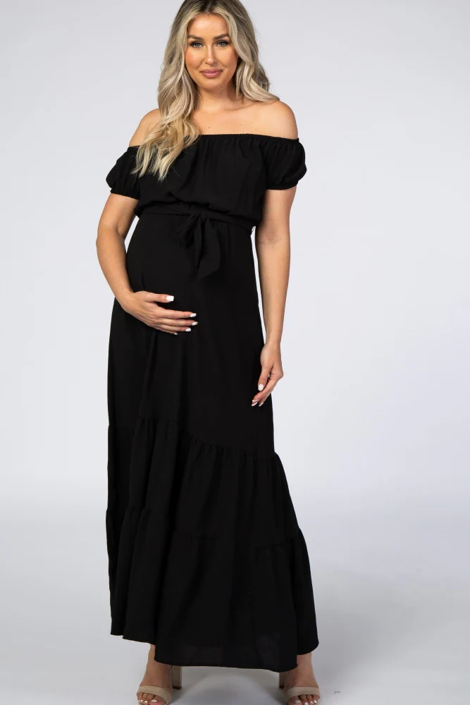 Image of Black Off Shoulder Ruffle Hem Maternity Maxi Dress