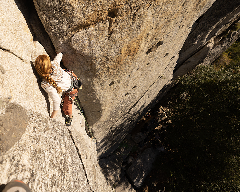 Image of a woman climbing
