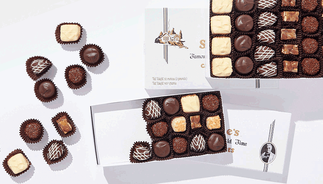 Animation of chocolate candies being added to a See’s candy box.
