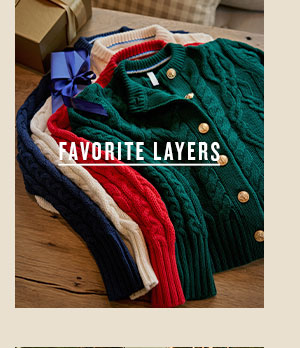 Favorite Layers. Women's knit sweaters stacked.