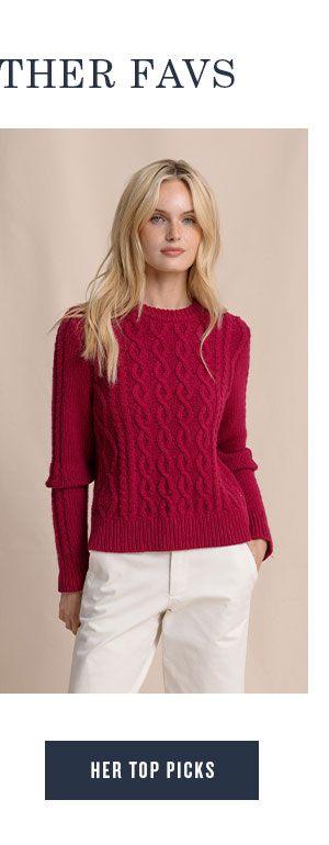 Woman in red knit sweater. Her Top Picks.