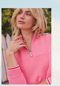 Woman in pink quarter zip.