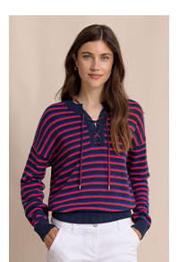 Woman in striped sweater.