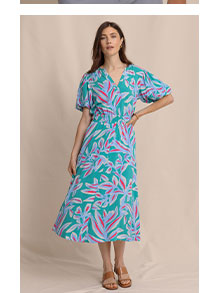 Woman in printed midi dress.