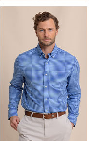 Man in blue plaid button down.