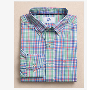 Folded green, blue, and orange sport shirt.