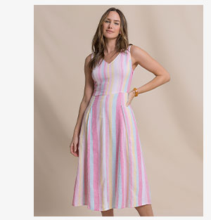 Woman in multi-colored midi dress.