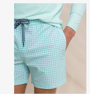 Green and white gingham swim trunks.