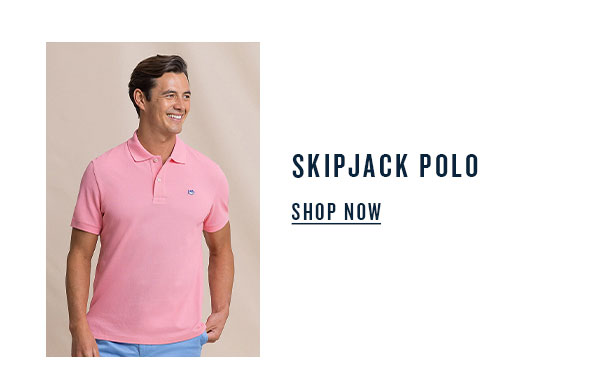 Skipjack polo. Shop now. Man in pink short sleeve polo shirt.