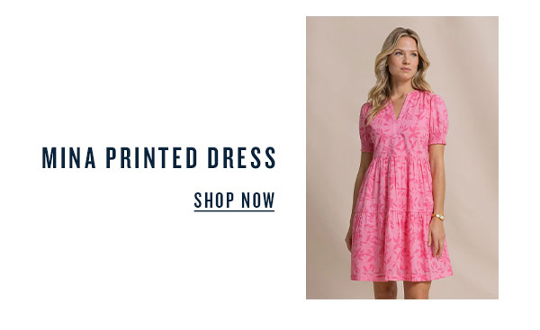 Mina Printed Dress. Shop now. Woman in pink short sleeve mini dress.