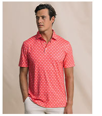 Man in coral fish patterned polo.