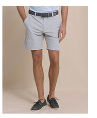 Man in light grey performance shorts.