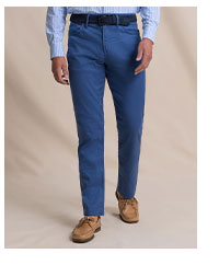 Man in navy dress pants.