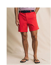 Man in red shorts.
