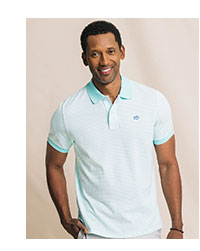 Man in green polo.