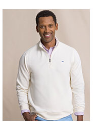 Man in white quarter zip.